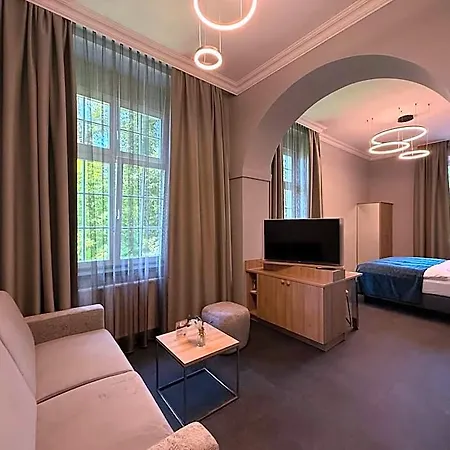 호텔 Schlosshotel Gruenwald 4*